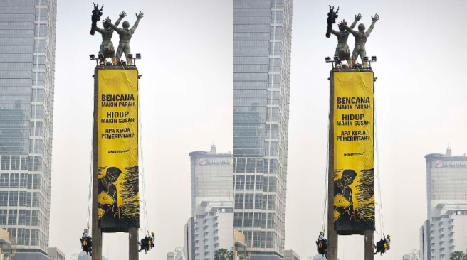 6 Aktivis Greenpeace Turun dari Monumen Bundaran HI Pakai Tali Sling, Dibawa ke Polda Metro Jaya